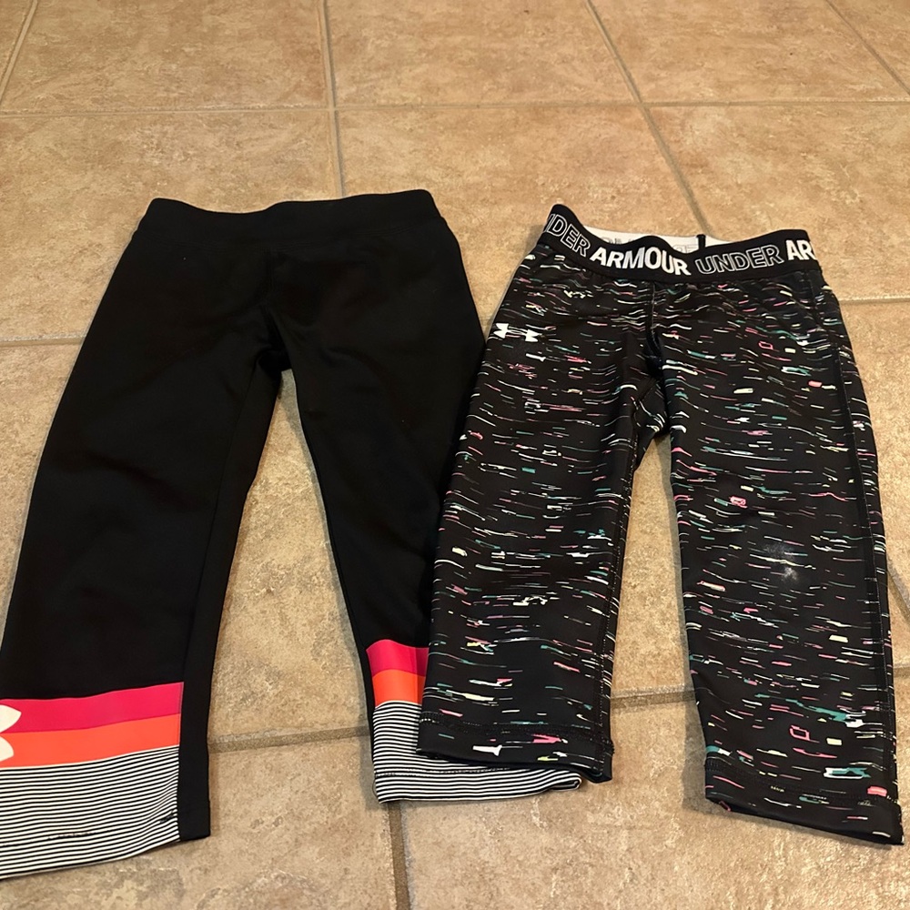 UA. Two pairs of capris/leggings. Girls 6. Great shape. Super cute. No pilling.